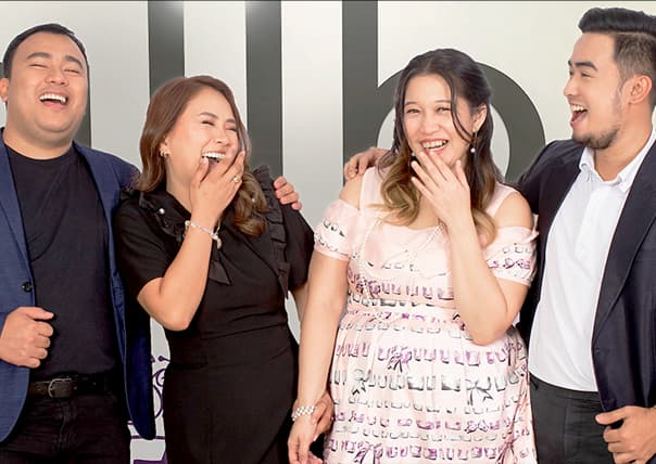 Mercury Labs team members laughing together