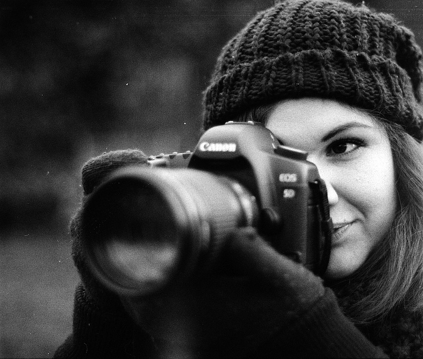 Girl holding a camera